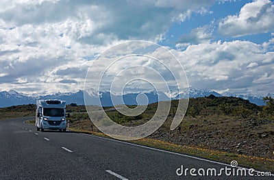 A campervan driving on the road in New Zealand Stock Photo