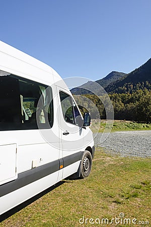 Campervan parked in a wilderness campsite in Fjordland Editorial Stock Photo