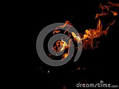 Campfire burning fire flame on black background, orange yellow fire flames night orange yellow fire flames moving Stock Photo