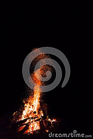 Campfire with flying sparks Stock Photo