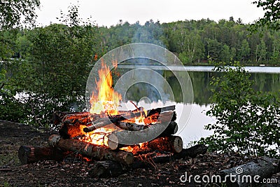 Campfire By the Lake Stock Photo