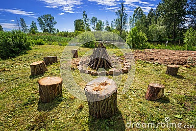 Campfire place at the lake in summer time Stock Photo