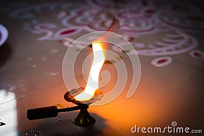 Camphor flame lamp as an offering to god for worship Stock Photo