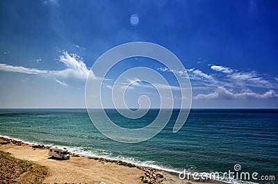 Camping on the beach with a caravan, freedom concept Stock Photo