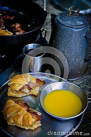 Camping Breakfast with Coffee and Orange Juice Stock Photo