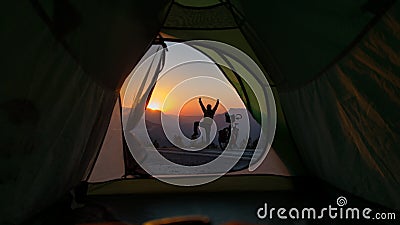 Camping life of long touring cyclist, positive and relaxing start to the day Stock Photo