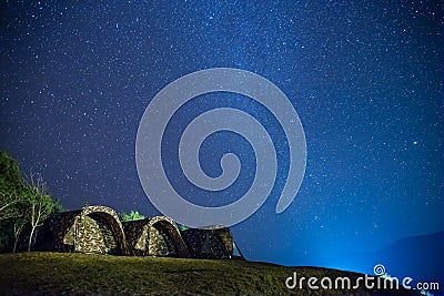 Camping with stars in the night sky - Doy Samur Dow, Nan, Thailand Stock Photo