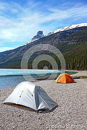 Camping Tents Wilderness Beach Mountain Blue Lake Canadian Rockies Stock Photo