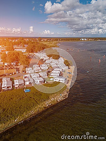 camping with trailers and campers at sea shore with beach, campsite aerial view Stock Photo