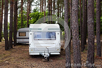 Camping trailers in the forest Stock Photo