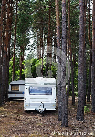 Camping trailers in the forest Stock Photo