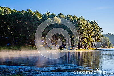 Camping and travel Beatiful nature panorama view of Pang Ung lake in the mist at sunrise Stock Photo