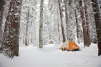 Camping during winter hiking in Carpathian mountains Stock Photo