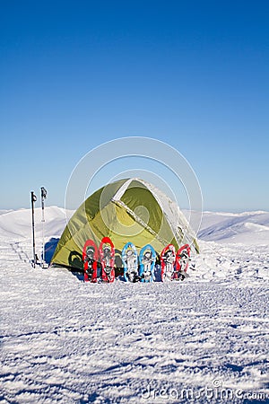 Camping during winter hiking in Carpathian mountains. Stock Photo