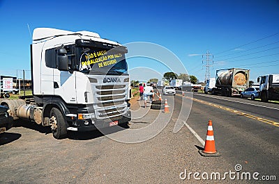 Stopped trucks on the highways for protest the diesel price increase in Brazil. Editorial Stock Photo