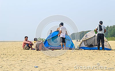 Campsite on beach. Tents on sea beach with sky and green background. Tent on the beach, Bay area day trip activities. Editorial Stock Photo