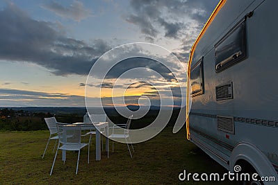 Campsite with caravans at dusk time Stock Photo