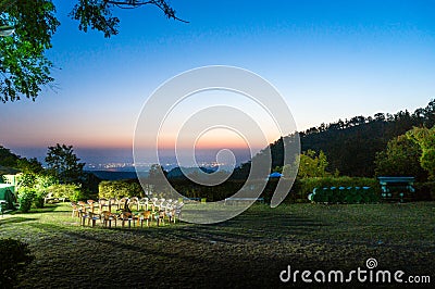 Campsite with chairs on a mountaintop with hills and beautiful s Stock Photo