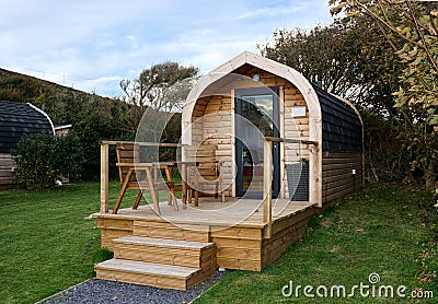 Campsite pods in a field. Stock Photo