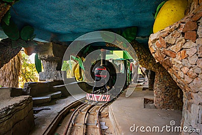 CAMYUVA, TURKEY: The train is in the lobby of the main building of the hotel Holiday Area Eco Dream Club Sea Resort. Editorial Stock Photo