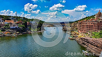 Wide image of Omkareshwar Jyotirlinga a shiv temple on Omkar mountain an island in Narmada, Madhyapradesh, India Stock Photo