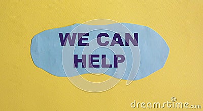 We can help you. Text on blue piece of paper Stock Photo