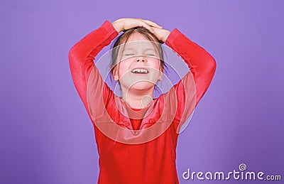 Can not stop her feelings. Lost emotional control. Girl little child emotional face expression. Almost mad. Unleashed Stock Photo
