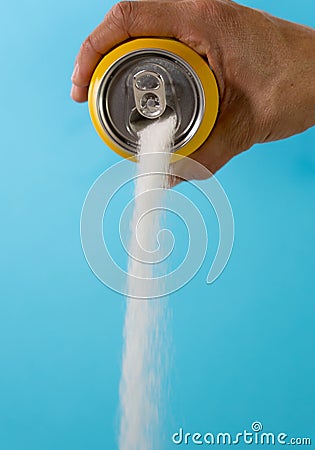 Can pouring sugar stream in calories content of soda energetic and refreshing drinks Stock Photo