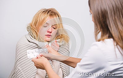She can rely to this doctor. Patient care and healthcare. Doctor visiting unhealthy woman at home. Medical doctor Stock Photo