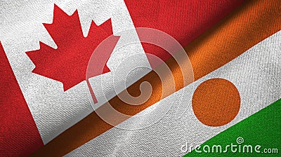 Canada and Niger two flags textile cloth, fabric texture Stock Photo