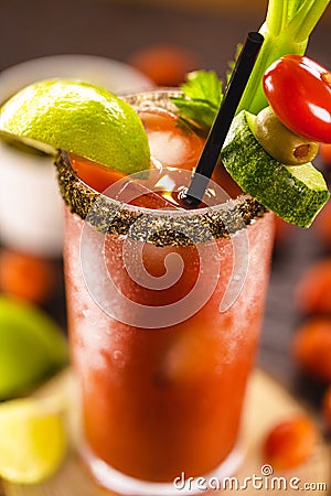 Canadian Caesar drink. Made with vodka, hot sauce and Worcestershire sauce, served with ice in a celery glass with a salted rim, Stock Photo