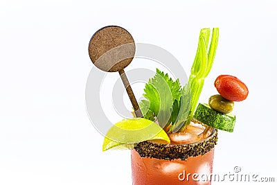 Canadian Caesar drink, typical Canadian drink, with hot sauce, celery, lemon, vodka and ice. copy space, isolated white background Stock Photo