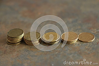 Canadian coins. Pile of Canadian dollar coins aka loonies Editorial Stock Photo