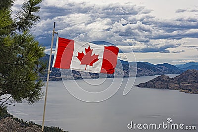 Canadian Flag over Okanagan Lake near Peachland British Columbia Canada Stock Photo