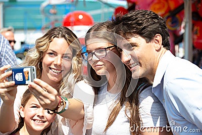 Canadian Prime Minister Justin Trudeau with girls Editorial Stock Photo