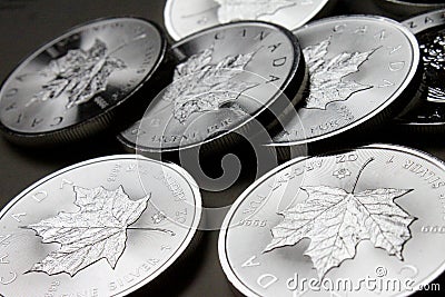 Canadian Maple Leaf Silver Coin stack Editorial Stock Photo