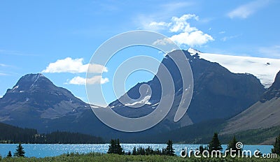 Canadian Rockies grass lake mountain Stock Photo