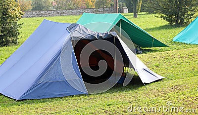 canadian tents on the camp site of boyscout in morning Stock Photo