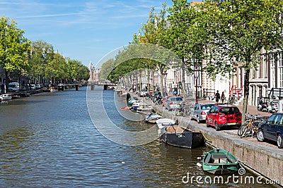 Canal in Amsterdam with historic mansions Editorial Stock Photo