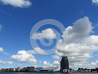 Canal in Amsterdam Netherlands houses the Amstel river landmark old European city summer landscape Stock Photo