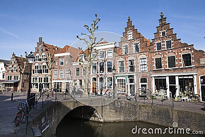 Canal and historic houses in the Netherlands Editorial Stock Photo