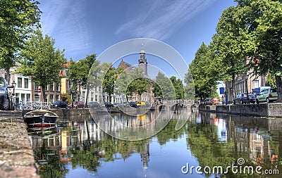 Historical buildings along a canal in Leiden, Holland Stock Photo