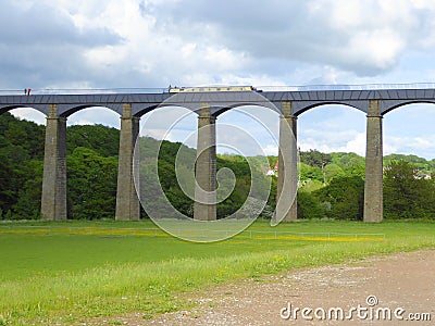 Canal narrowboat passing over aqueduct Stock Photo