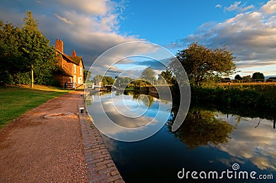 Canal, towpath and locks Stock Photo