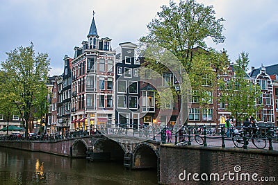 Canal and traditional houses in Amsterdam Editorial Stock Photo