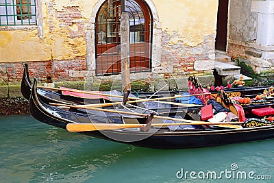 Canal with two gondolas in Venice, Italy. Architecture and landmarks of Venice. Venice postcard with Venice gondolas. Stock Photo