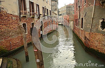 Canals Running Between Buildings that Have Deterioted Over Time Stock Photo