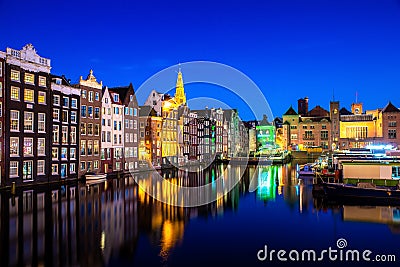 Canals and tradition house in Amsterdam at night. Amsterdam is the capital and most populous city of the Netherlands Stock Photo