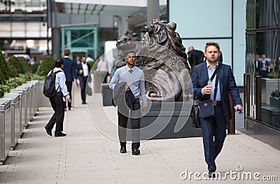 Canary Wharf business life. Group of business people going to work Editorial Stock Photo