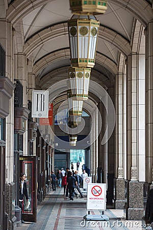 Canary Wharf business life. Group of business people going to work Editorial Stock Photo